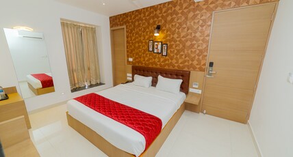 SRI K RESIDENCY Room Type - Deluxe Room