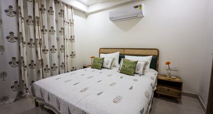 Roastery Retreat by Pumpkin Stays Room Type - Private room with ensuite washroom & balcony in 3BHK apartment