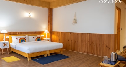The Riverside Boutique Inn - Tirthan Valley Room Type - Superior King Room with River and Mountain View The Riverside Boutique Inn - Tirthan Valley Room Type - Superior King Room with River and Mountain View
