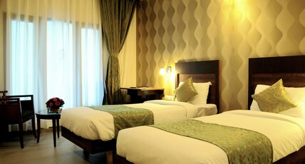 Hotel Quality Inn Mint Room Type - Deluxe Room