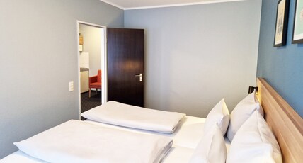 Garner Hotel BOCHUM by IHG Room Type - 1 BEDROOM SUITE TWIN BEDS WITH KITCHEN AREA