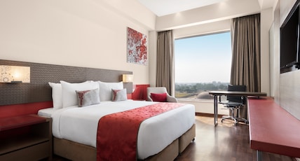 Ramada by Wyndham Lucknow Hotel and Convention Center Room Type - 1 Queen Bed Smoking Room Ramada by Wyndham Lucknow Hotel and Convention Center Room Type - 1 Queen Bed Smoking Room