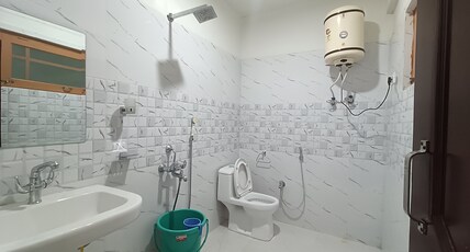 New International Guest House Room Type - Deluxe Double Room