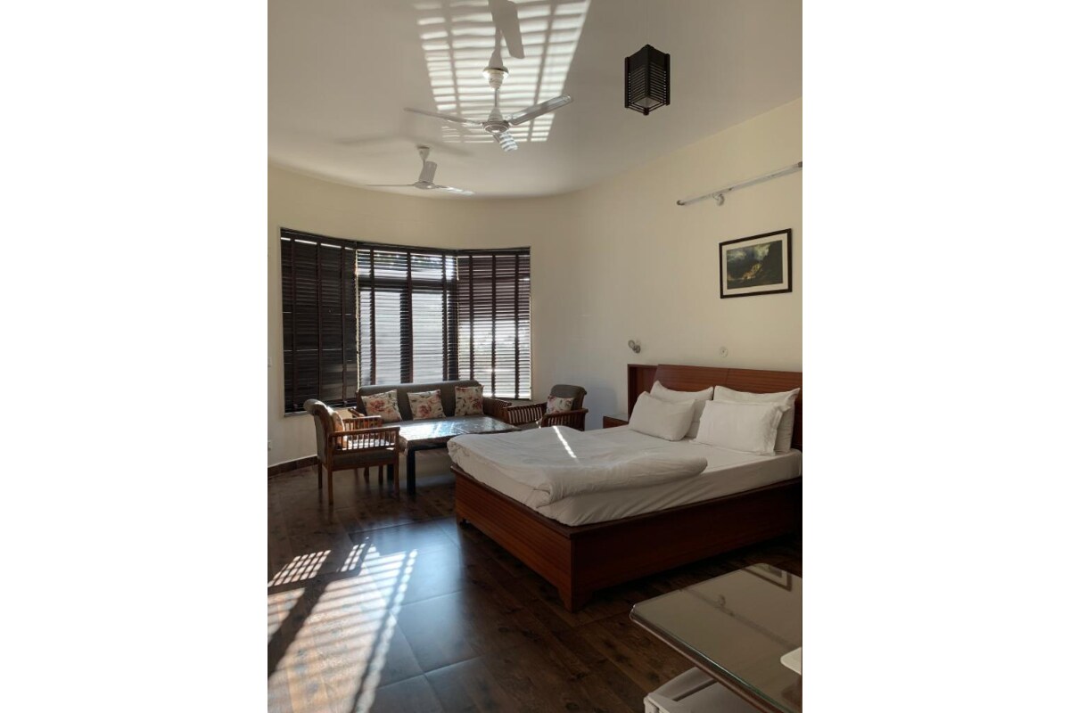 The Sojourn Adharshila Rooms and Cottages - Tap to explore photos