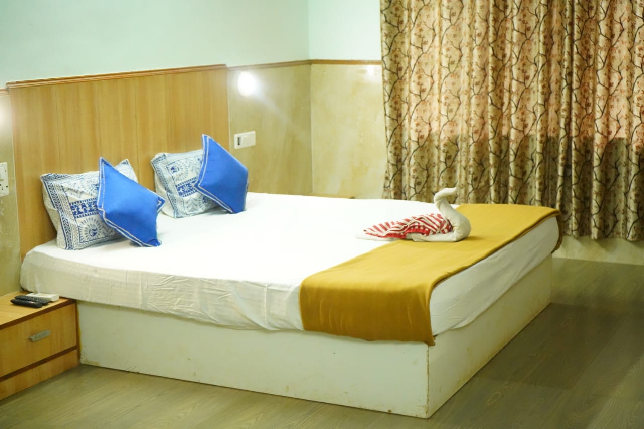 UK Inn Rooms with Restaurant Siddapur - Tap to explore photos