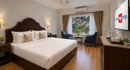 Hotel Metropolis Nearby Dal Lake Room Type - Premium Deluxe Room AC - Mountain/Garden View Hotel Metropolis Nearby Dal Lake Room Type - Premium Deluxe Room AC - Mountain/Garden View