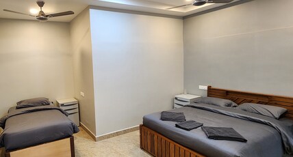 V2 VEDHA RESIDENCY Room Type - Deluxe AC Room