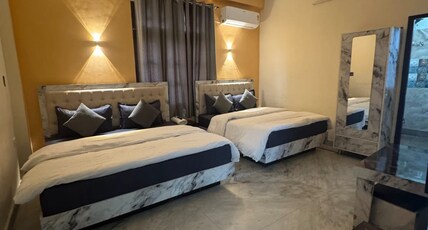 BHAGIRATHI RESIDENCY Room Type - Family Room 2 Double Bed BHAGIRATHI RESIDENCY Room Type - Family Room 2 Double Bed