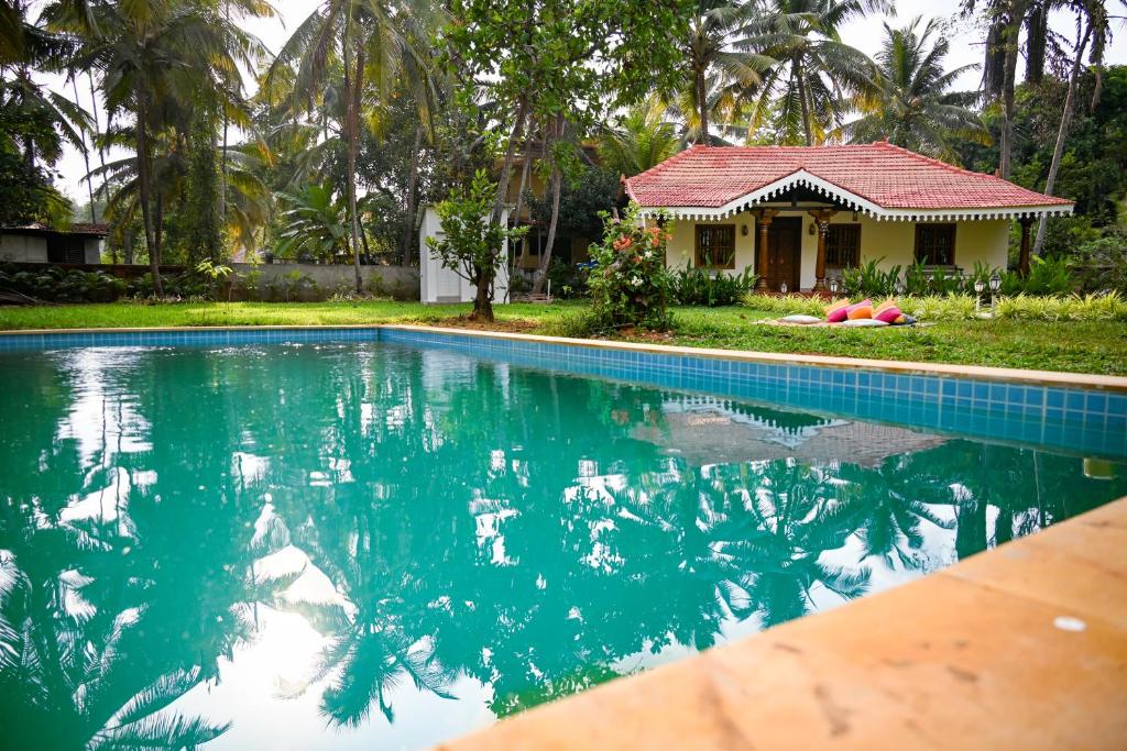 White Serenity Heritage Pool Villa near Beach Udupi - Tap to explore photos