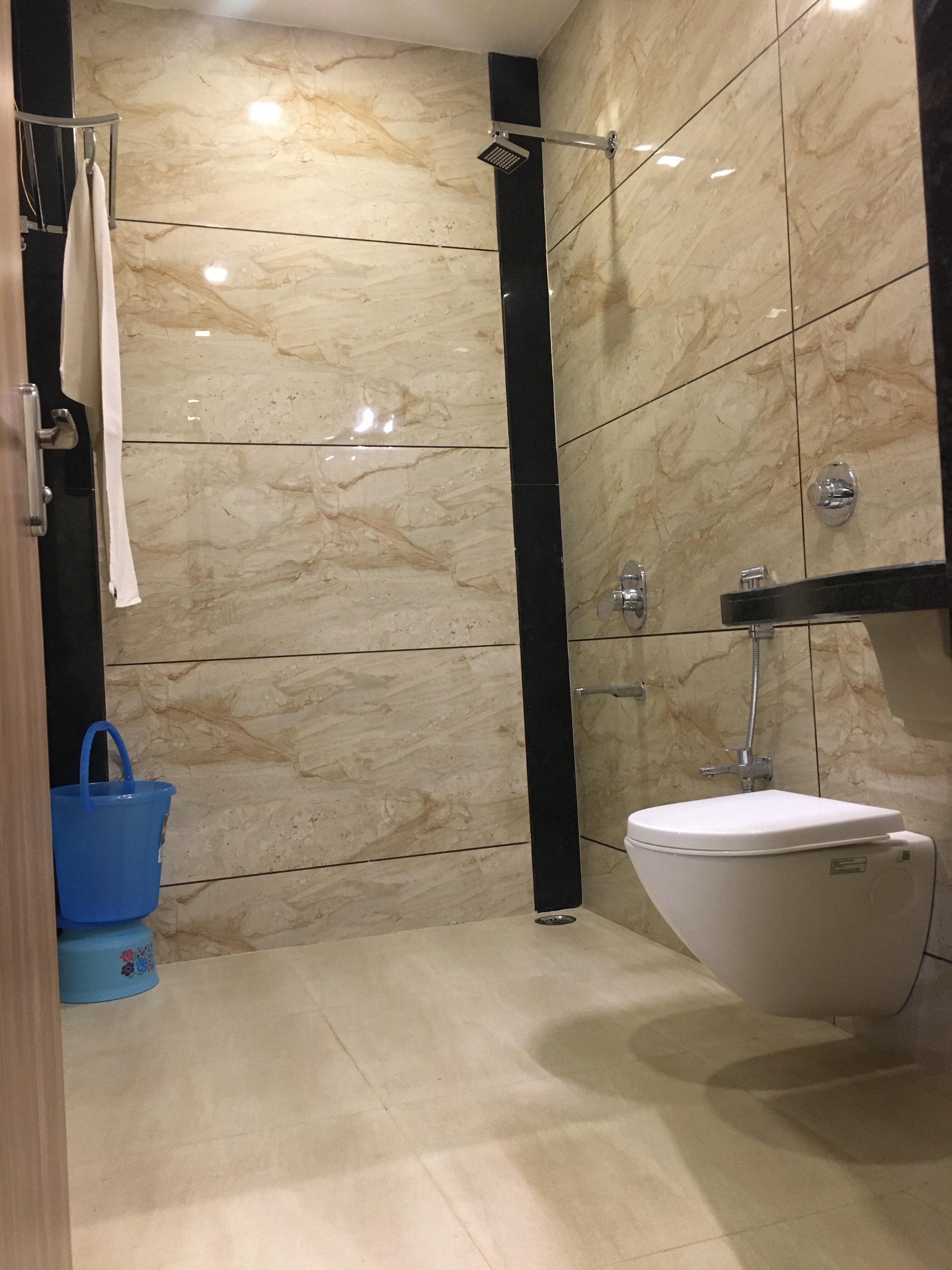 Hotel New Golden Veena - Tap to explore photos