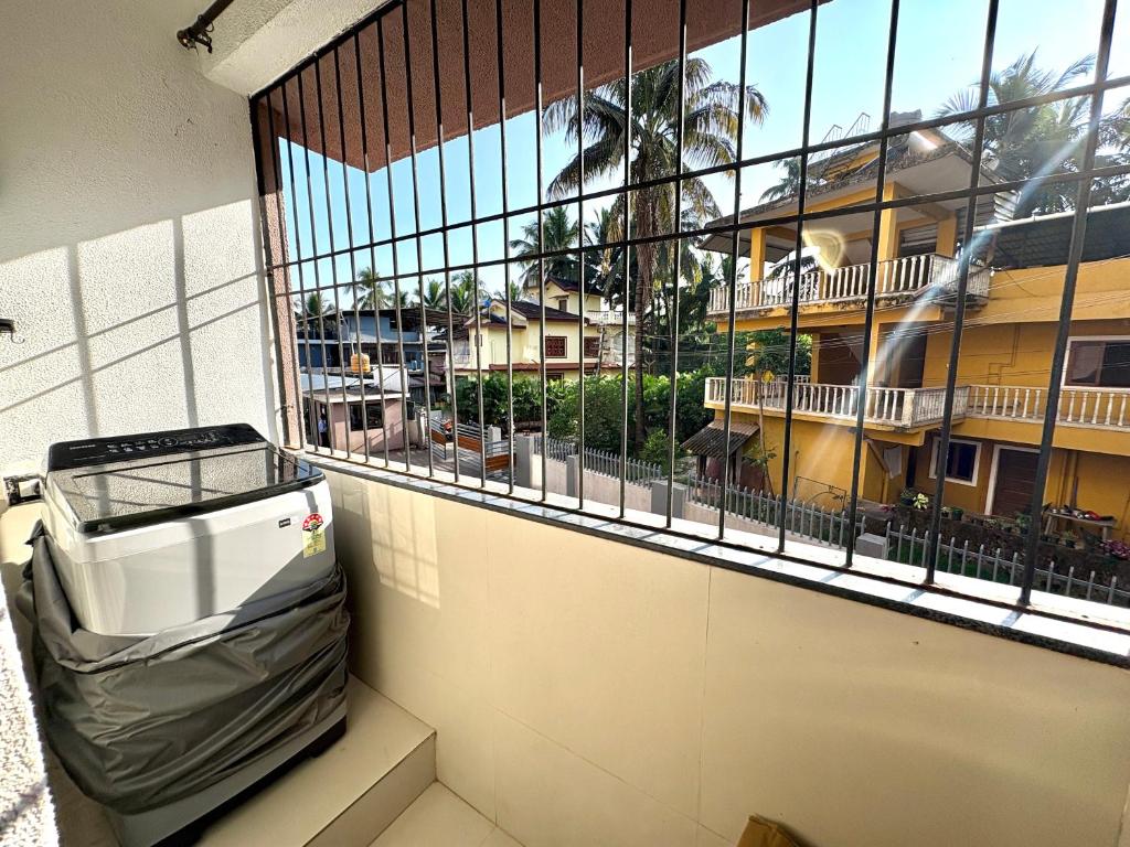 Peaceful Refined 1BHK Velvet Escape in Candolim Goa - Tap to explore photos