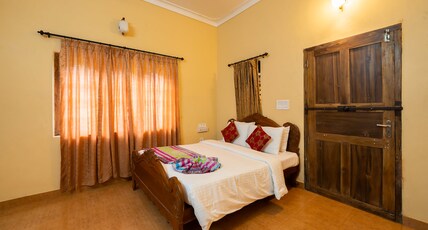 Misty Heights by The Sanihara  Room Type - Garden-view Deluxe Room Non AC