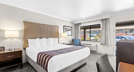 Best Western Garden Inn Room Type - 1 King Bed, Non-Smoking, Larger Room, Microwave, Refrigerator, High Speed Internet Access Best Western Garden Inn Room Type - 1 King Bed, Non-Smoking, Larger Room, Microwave, Refrigerator, High Speed Internet Access