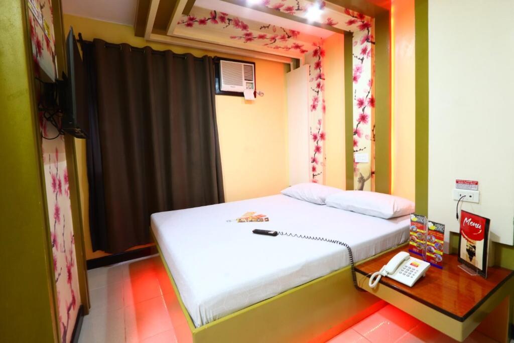Hotel Sogo Yabut - Tap to explore photos