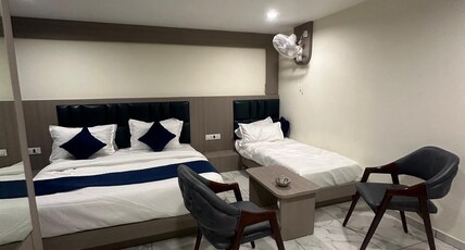 HOTEL SHYAM INN Room Type - DELUXE TRIPLE BED ROOM