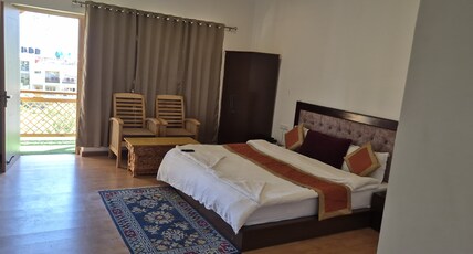 gyalu residency Room Type - Deluxe Room with Mountain View Bed