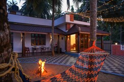 Swarna Sharada River Side Cottage House