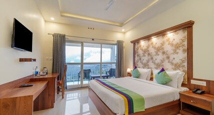 Treebo Windsong Resort Munnar, Tea Plantation View Room Type - Standard Room with Mountain View