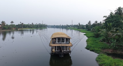 Winterfeel Luxury Cruises by Neon Nest Hotels Room Type - Super Deluxe Room in sharing Houseboat - Ac timings from 9 Pm to 6 Am Winterfeel Luxury Cruises by Neon Nest Hotels Room Type - Super Deluxe Room in sharing Houseboat - Ac timings from 9 Pm to 6 Am