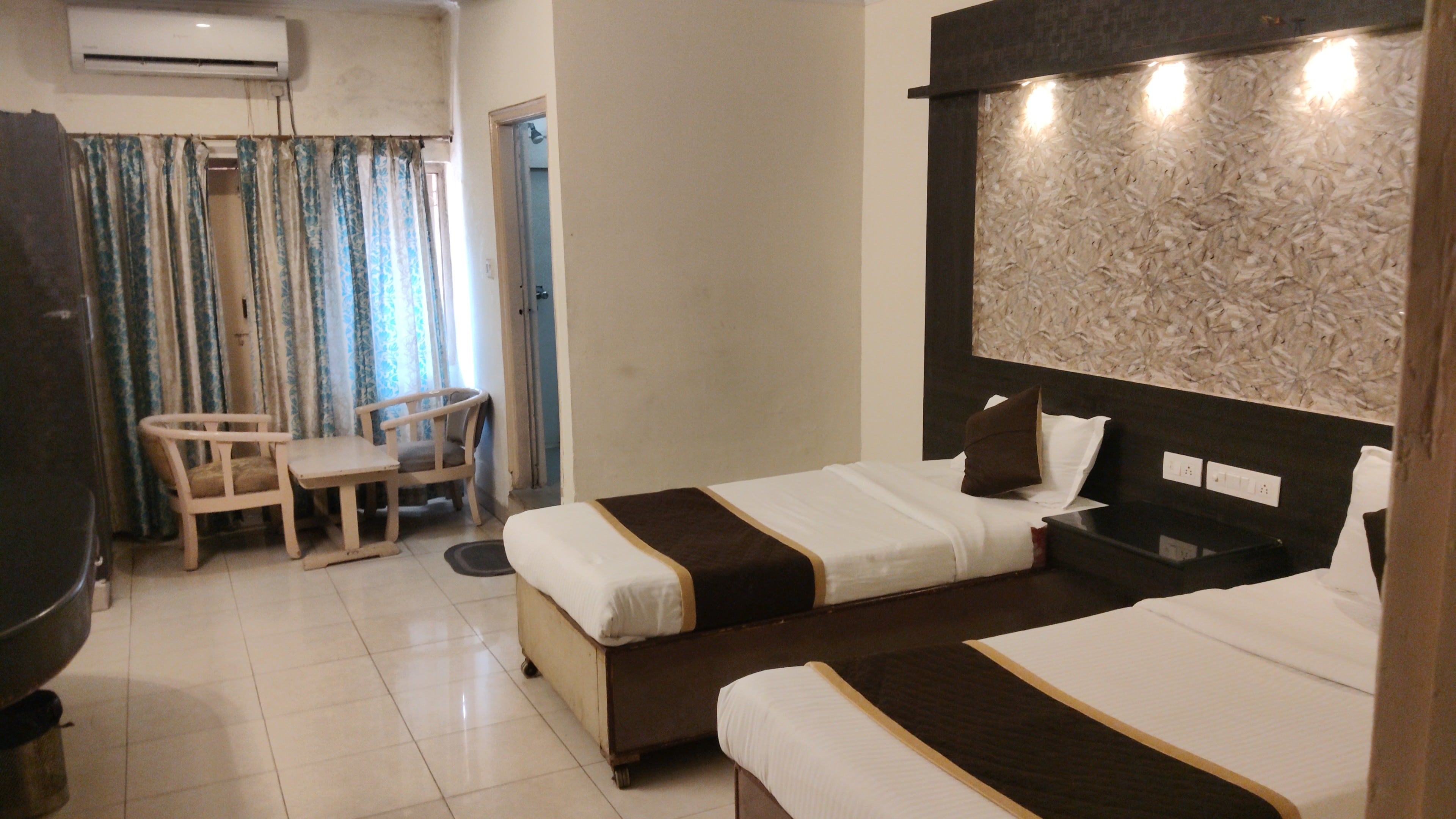 Hotel Sri Sai Grand Central - Tap to explore photos