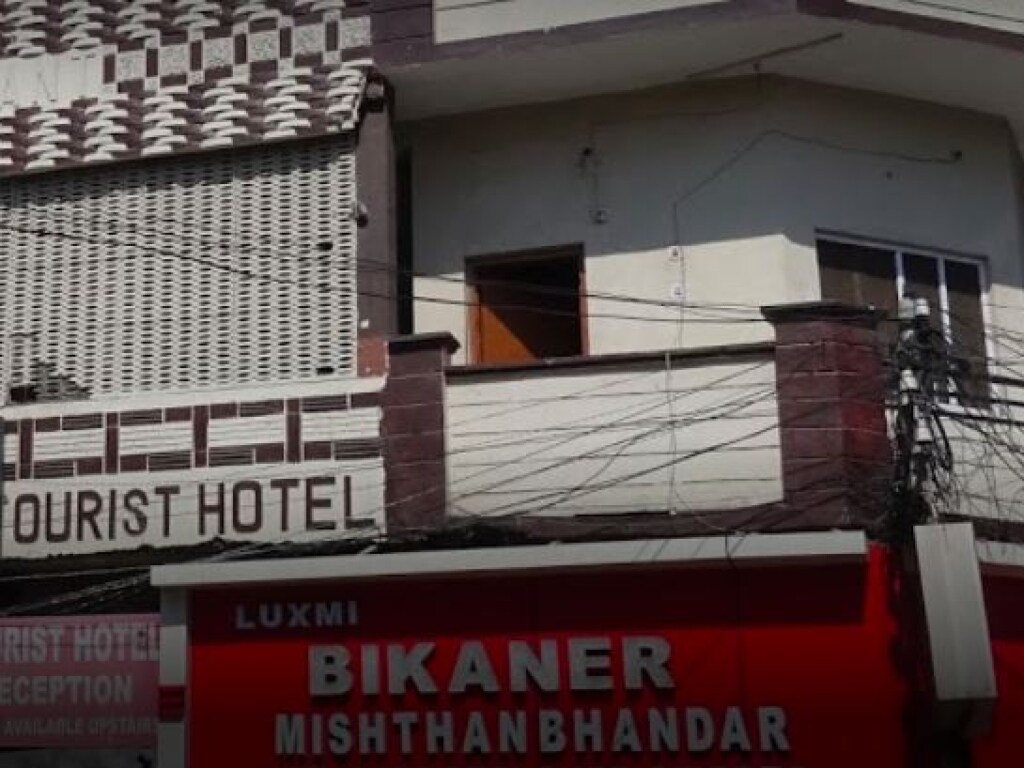 Tourist Hotel - Tap to explore photos