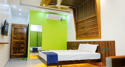 Ocean Queen Palace Poovar Room Type - Antarctica - Beach and garden view room  ( Room no : 10 )