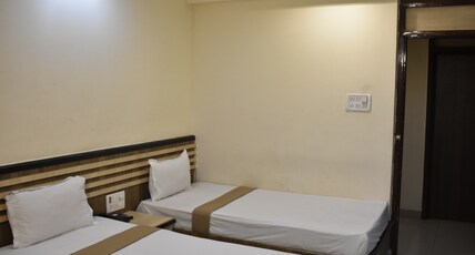 Hotel Aditya (Near RIMS Bariatu Ranchi) Room Type - Deluxe Ac Twin Bedded