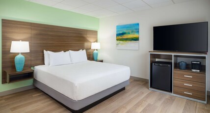 Best Western Naples Inn & Suites Room Type - Accessible - 1 King, Mobility Accessible, Roll In Shower, Microwave And Refrigerator, Non-Smoking, F Best Western Naples Inn & Suites Room Type - Accessible - 1 King, Mobility Accessible, Roll In Shower, Microwave And Refrigerator, Non-Smoking, F