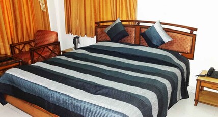 HOTEL SIDHARTH Room Type - Deluxe Room