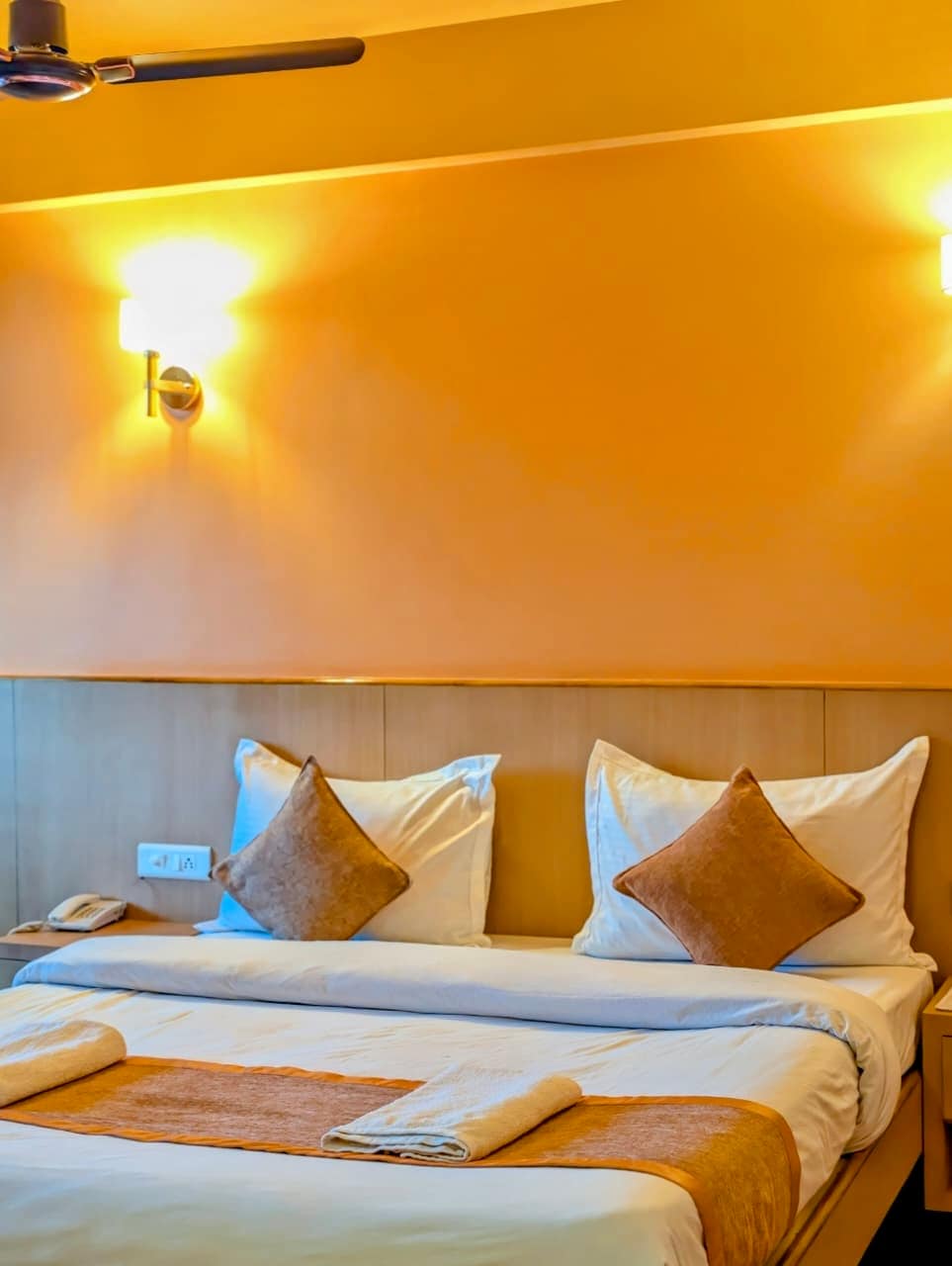 Orange Inn Stay | Rooms & Restaurant - Tap to explore photos