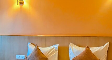 Orange Inn Stay | Rooms & Restaurant Room Type - Superior Executive Queen Room
