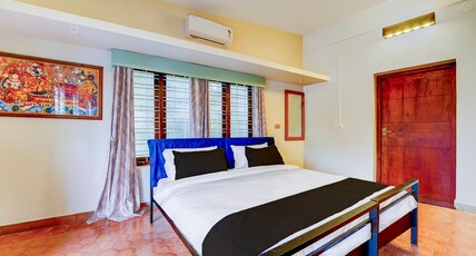 Super HotelO CSIR Pappanamcode Formerly Ambadi Guest House Room Type - Deluxe
