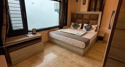 The Home Inn Shimla Room Type - Deluxe queen room