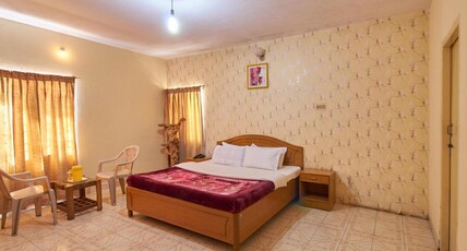 Rainbow Cottages-Budget Friendly Rooms & Restaurant Room Type - Double  Cot Super Deluxe Room