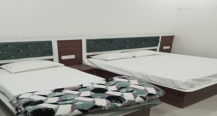 RADHARAMAN GUEST HOUSE Room Type - DELUXE TRIPLE ROOM