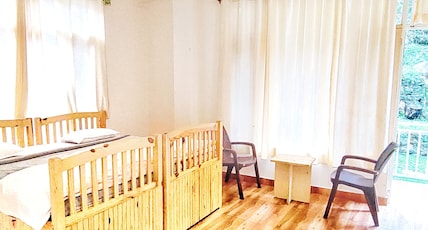 The Culture Nation Hostel | Rooms & Dorms Room Type - Deluxe Room With Balcony ( Garden View ) ( 200 MBPS WIFI )