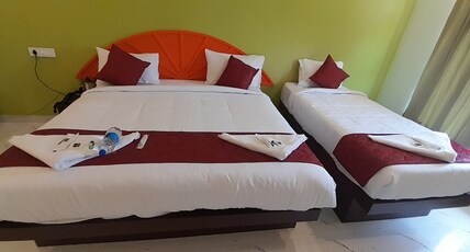 Hotel Rajeswari International Room Type - Deluxe Triple Room
