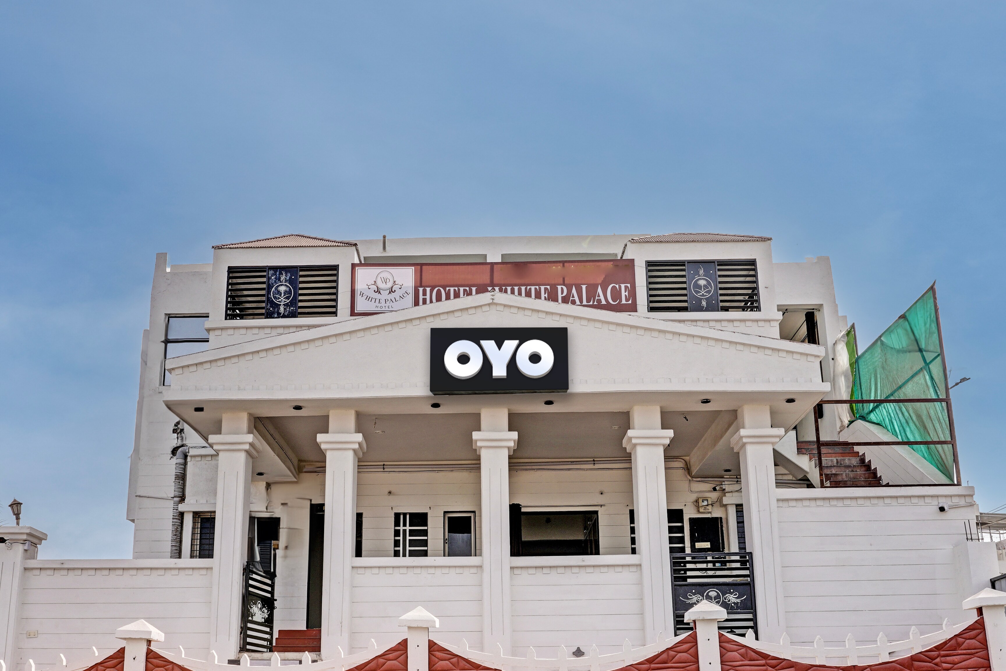 Hotel O White Palace Hotel - Tap to explore photos