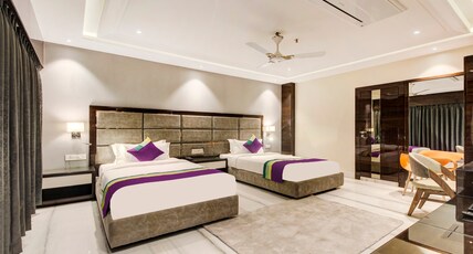Treebo Premium Tahoora International Room Type - Deluxe Room