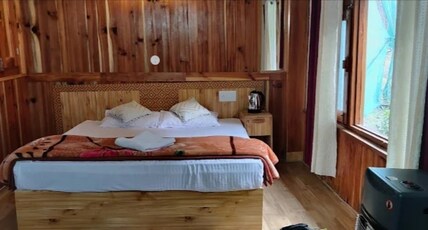 Tirthan mid point Room Type - Deluxe river view room 2