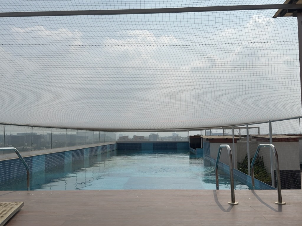 2 Min Airport | Runway View Balcony | Sky Pool - Tap to explore photos