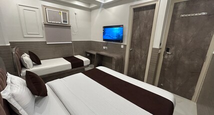 Shree Guru Room Type - Deluxe Triple Bed Room