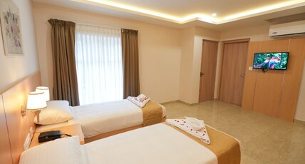 SAUPARNIKA REGENCY Room Type - DELUXE TWINE BED