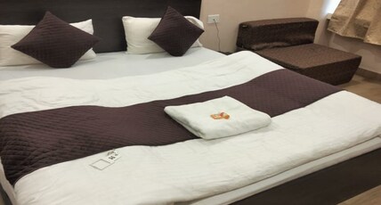 RUDRANSH RESIDENCY Room Type - Deluxe Room