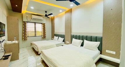 Maa Narmada Hotel & Family Restaurant Room Type - Deluxe Four Bed Room