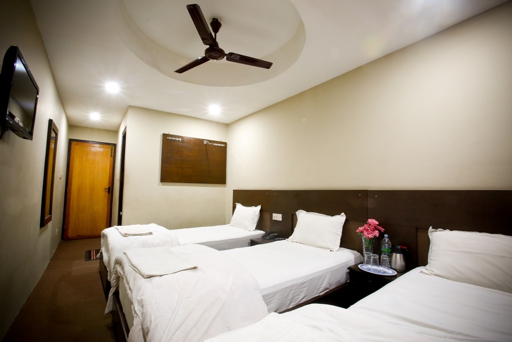 Hotel Nandini - Tap to explore photos