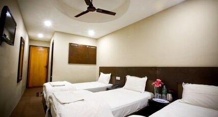 Hotel Nandini Room Type - Deluxe Triple room