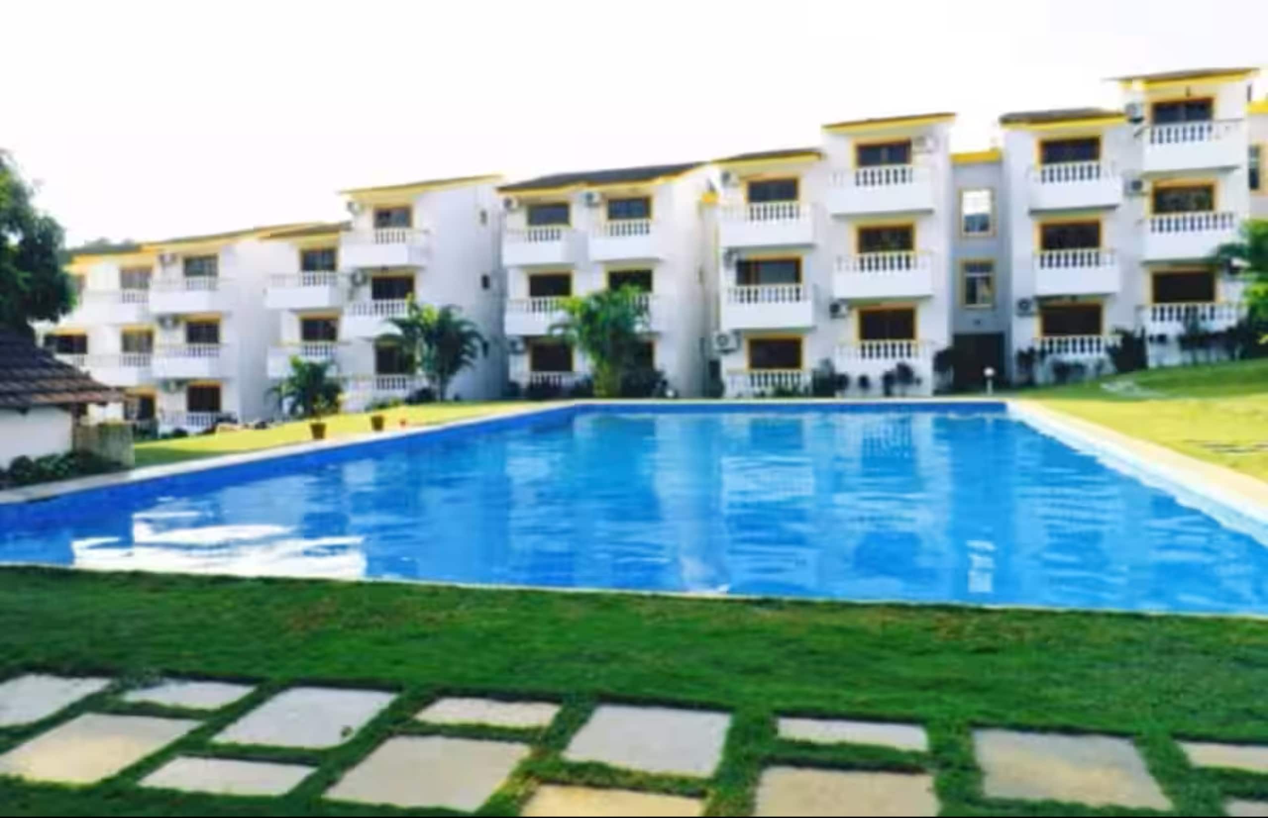 Peaceful Stay Near Candolim BeachGreenwood Meadows - Tap to explore photos