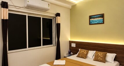 Radhakrushna Retreat Room Type - Deluxe AC Room