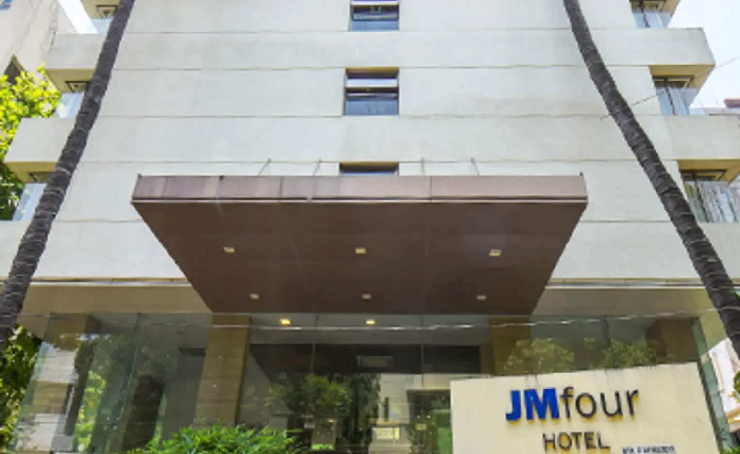 J M Four Hotel - Tap to explore photos